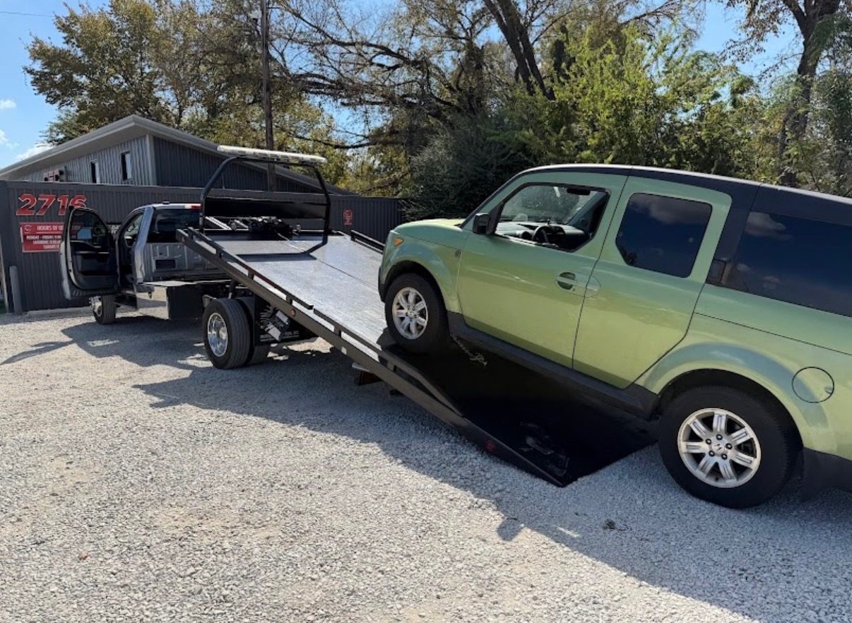 CFC Recycling tow truck picking up a vehicle