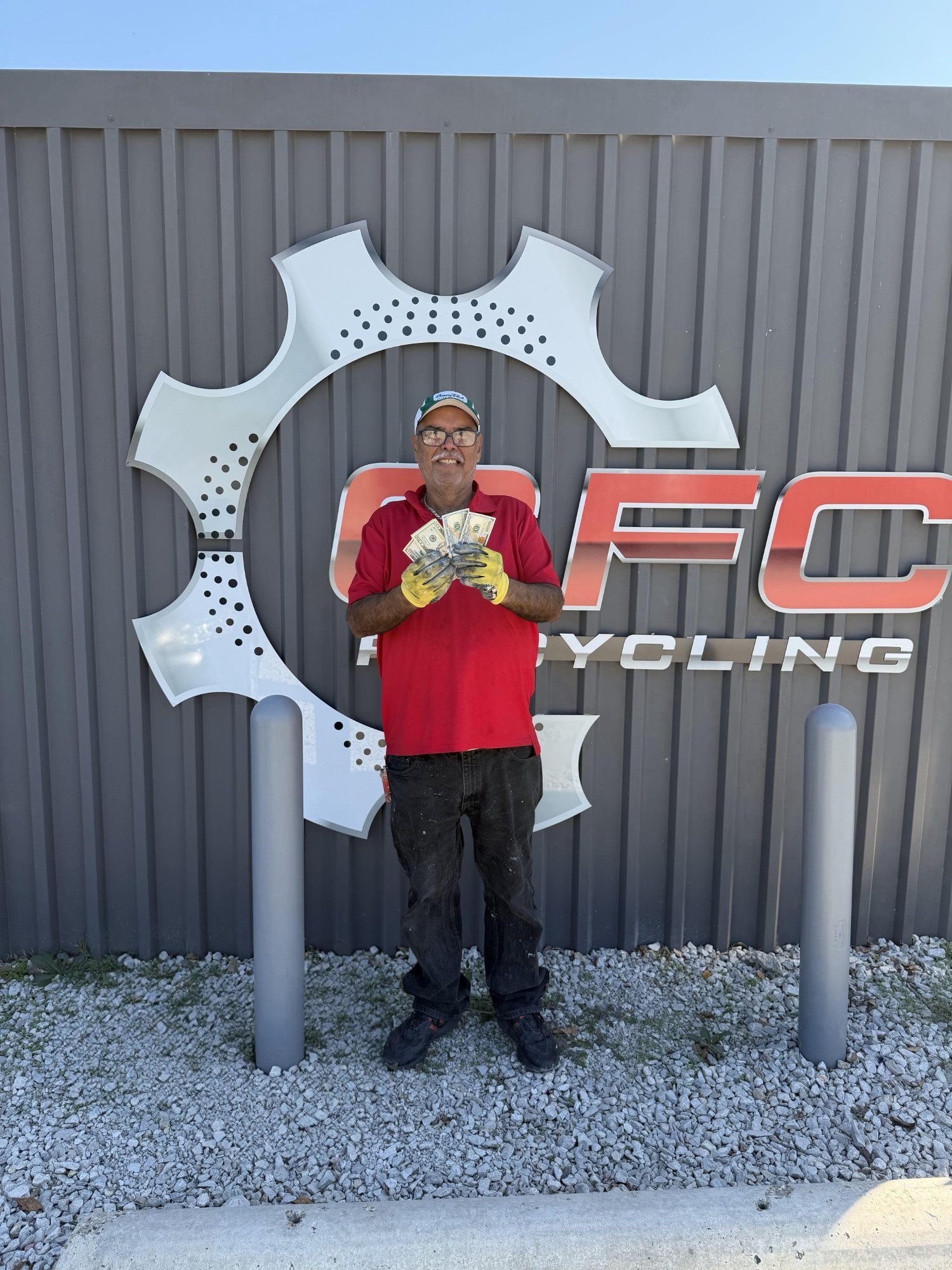 Happy CFC Recycling customer with cash payment